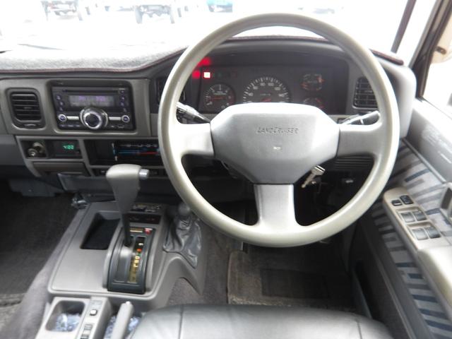 ランドクルーザープラド SXワイドリミテッド メモリアルパッケージ 1ナンバー登録・5人乗り・リフトアップ・社外15インチアルミホイール・ヨコハマM/Tタイヤ・黒レザーシートカバー・ETC付き(27枚目)