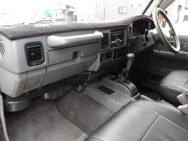 ランドクルーザープラド SXワイドリミテッド メモリアルパッケージ 1ナンバー登録・5人乗り・リフトアップ・社外15インチアルミホイール・ヨコハマM/Tタイヤ・黒レザーシートカバー・ETC付き(38枚目)