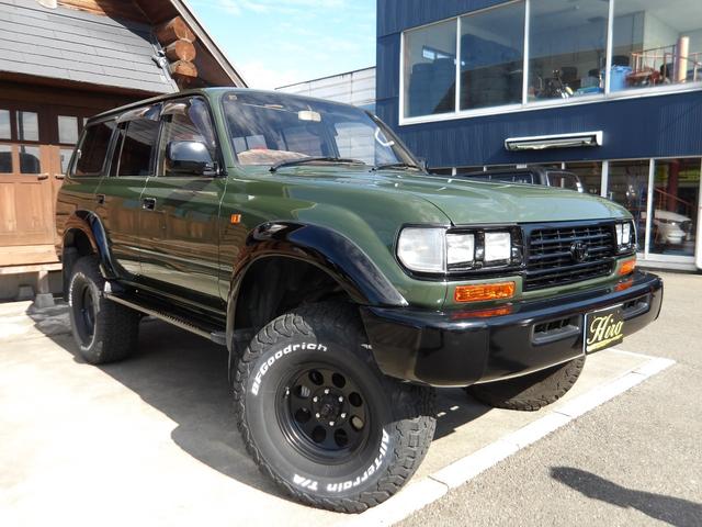 ランドクルーザー80 VXリミテッド 1ナンバー登録・サンルーフ・社外足廻りリフトアップ・HDDナビ&フルセグTV・DVD再生・Bluetooth対応・バックカメラ・角目4灯仕様LEDヘッドライト・社外アルミホイール・M/Tタイヤ・ETC(4枚目)