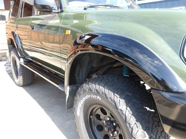 ランドクルーザー80 VXリミテッド 1ナンバー登録・サンルーフ・社外足廻りリフトアップ・HDDナビ&フルセグTV・DVD再生・Bluetooth対応・バックカメラ・角目4灯仕様LEDヘッドライト・社外アルミホイール・M/Tタイヤ・ETC(7枚目)