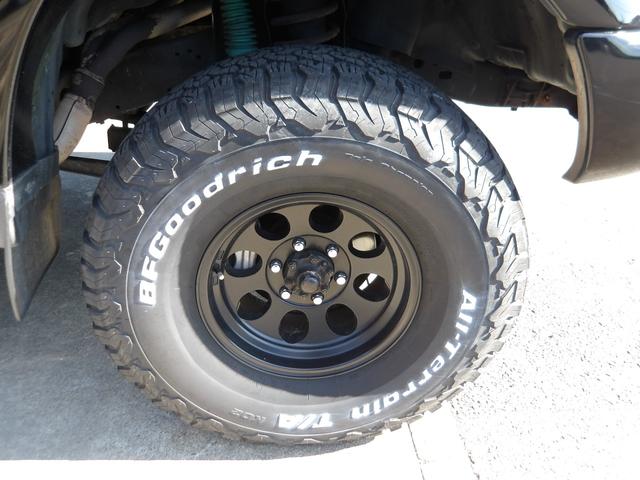 ランドクルーザー80 VXリミテッド 1ナンバー登録・サンルーフ・社外足廻りリフトアップ・HDDナビ&フルセグTV・DVD再生・Bluetooth対応・バックカメラ・角目4灯仕様LEDヘッドライト・社外アルミホイール・M/Tタイヤ・ETC(12枚目)