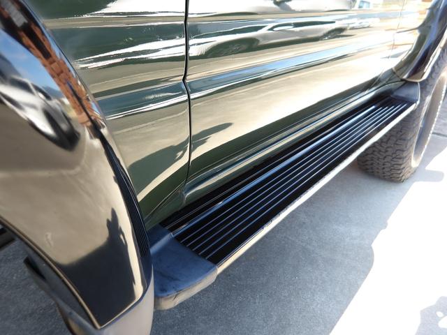 ランドクルーザー80 VXリミテッド 1ナンバー登録・サンルーフ・社外足廻りリフトアップ・HDDナビ&フルセグTV・DVD再生・Bluetooth対応・バックカメラ・角目4灯仕様LEDヘッドライト・社外アルミホイール・M/Tタイヤ・ETC(26枚目)