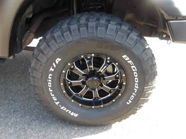 ランドクルーザー８０ ＶＸリミテッド　１ナンバー登録・サンルーフ・ＳＤナビ＆ＴＶ・ＤＶＤ再生・角目４灯仕様ＬＥＤヘッドライト・リフトアップ・社外１６インチアルミ＆ＢＦグッドリッチタイヤ・ＡＲＢバンパー・レザーシートカバー（34枚目）