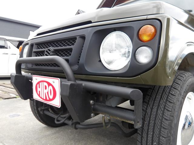ジムニー ワイルドウインド　純正ルーフキャリア・社外ホイール・社外Ｆバンパーガード・ＣＤオーディオ・ウッドステアリング・皮調シートカバー・ブラックグリル・ＥＴＣ付（6枚目）