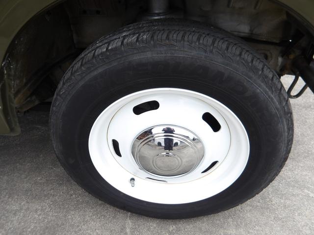 ジムニー ワイルドウインド　純正ルーフキャリア・社外ホイール・社外Ｆバンパーガード・ＣＤオーディオ・ウッドステアリング・皮調シートカバー・ブラックグリル・ＥＴＣ付（7枚目）