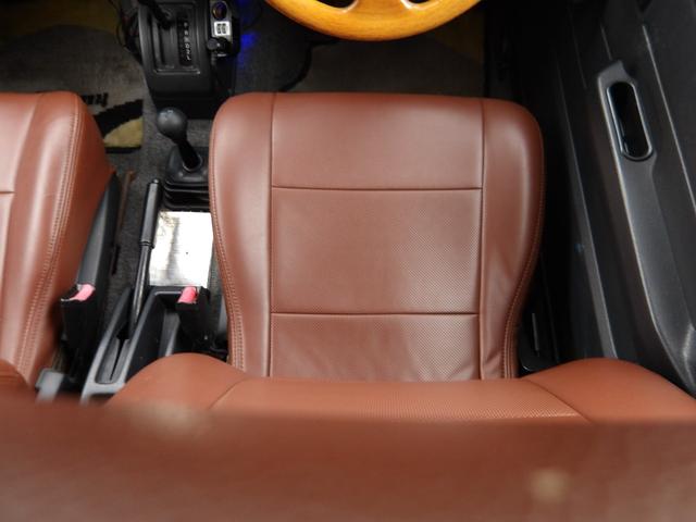 ジムニー ワイルドウインド　純正ルーフキャリア・社外ホイール・社外Ｆバンパーガード・ＣＤオーディオ・ウッドステアリング・皮調シートカバー・ブラックグリル・ＥＴＣ付（8枚目）