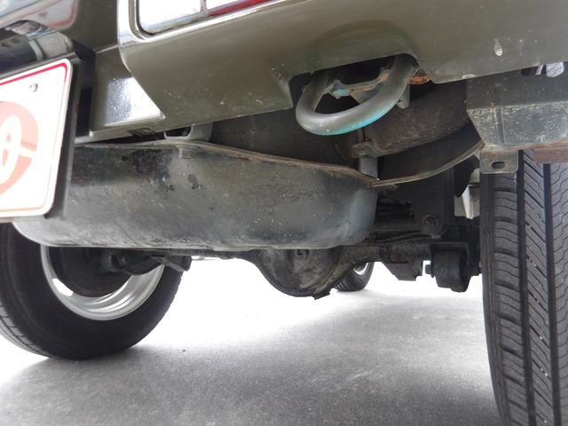 ジムニー ワイルドウインド　純正ルーフキャリア・社外ホイール・社外Ｆバンパーガード・ＣＤオーディオ・ウッドステアリング・皮調シートカバー・ブラックグリル・ＥＴＣ付（12枚目）