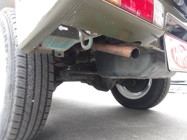 ジムニー ワイルドウインド　純正ルーフキャリア・社外ホイール・社外Ｆバンパーガード・ＣＤオーディオ・ウッドステアリング・皮調シートカバー・ブラックグリル・ＥＴＣ付（13枚目）