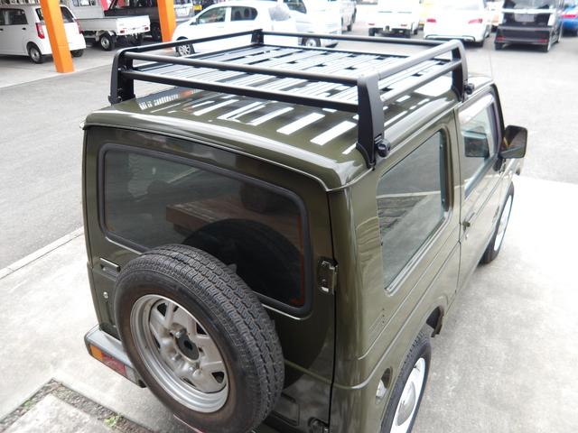 ジムニー ワイルドウインド　純正ルーフキャリア・社外ホイール・社外Ｆバンパーガード・ＣＤオーディオ・ウッドステアリング・皮調シートカバー・ブラックグリル・ＥＴＣ付（14枚目）