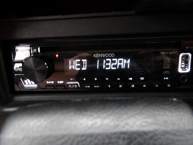 ジムニー ワイルドウインド　純正ルーフキャリア・社外ホイール・社外Ｆバンパーガード・ＣＤオーディオ・ウッドステアリング・皮調シートカバー・ブラックグリル・ＥＴＣ付（15枚目）