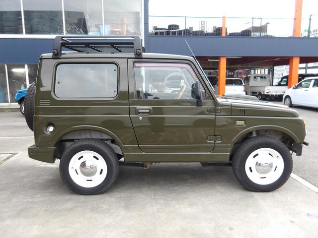 ジムニー ワイルドウインド　純正ルーフキャリア・社外ホイール・社外Ｆバンパーガード・ＣＤオーディオ・ウッドステアリング・皮調シートカバー・ブラックグリル・ＥＴＣ付（21枚目）