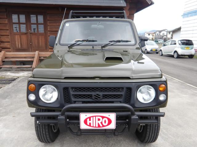 ジムニー ワイルドウインド　純正ルーフキャリア・社外ホイール・社外Ｆバンパーガード・ＣＤオーディオ・ウッドステアリング・皮調シートカバー・ブラックグリル・ＥＴＣ付（23枚目）