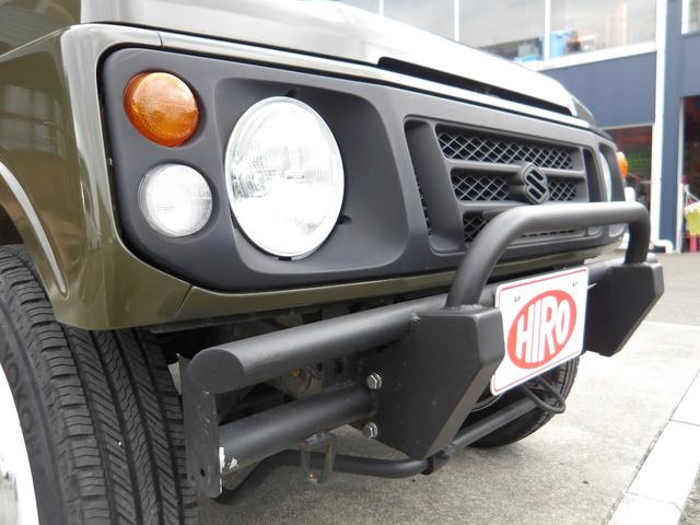 ジムニー ワイルドウインド　純正ルーフキャリア・社外ホイール・社外Ｆバンパーガード・ＣＤオーディオ・ウッドステアリング・皮調シートカバー・ブラックグリル・ＥＴＣ付（24枚目）