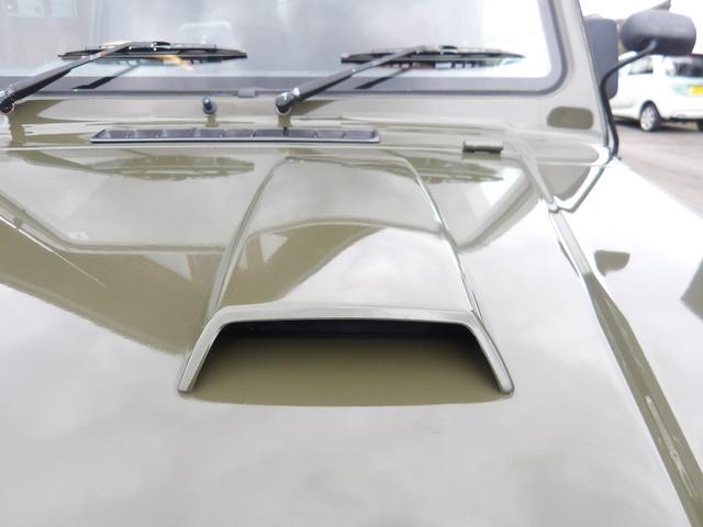 ジムニー ワイルドウインド　純正ルーフキャリア・社外ホイール・社外Ｆバンパーガード・ＣＤオーディオ・ウッドステアリング・皮調シートカバー・ブラックグリル・ＥＴＣ付（25枚目）