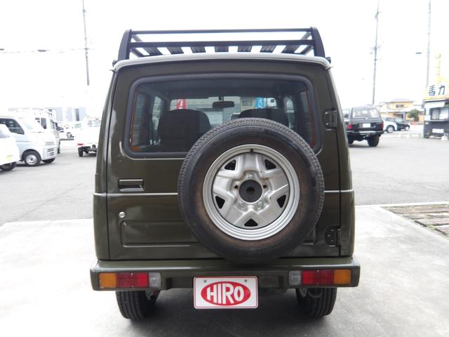 ジムニー ワイルドウインド　純正ルーフキャリア・社外ホイール・社外Ｆバンパーガード・ＣＤオーディオ・ウッドステアリング・皮調シートカバー・ブラックグリル・ＥＴＣ付（29枚目）