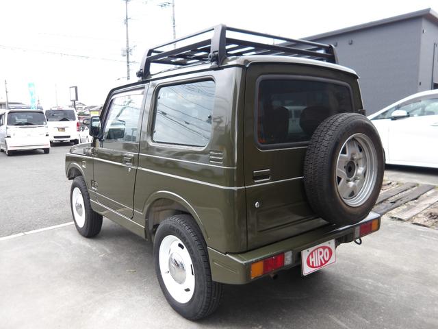 ジムニー ワイルドウインド　純正ルーフキャリア・社外ホイール・社外Ｆバンパーガード・ＣＤオーディオ・ウッドステアリング・皮調シートカバー・ブラックグリル・ＥＴＣ付（30枚目）