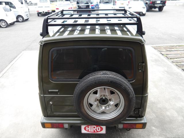 ジムニー ワイルドウインド　純正ルーフキャリア・社外ホイール・社外Ｆバンパーガード・ＣＤオーディオ・ウッドステアリング・皮調シートカバー・ブラックグリル・ＥＴＣ付（31枚目）