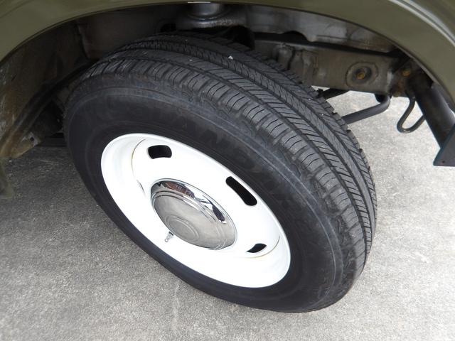 ジムニー ワイルドウインド　純正ルーフキャリア・社外ホイール・社外Ｆバンパーガード・ＣＤオーディオ・ウッドステアリング・皮調シートカバー・ブラックグリル・ＥＴＣ付（32枚目）