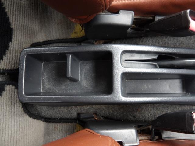 ジムニー ワイルドウインド　純正ルーフキャリア・社外ホイール・社外Ｆバンパーガード・ＣＤオーディオ・ウッドステアリング・皮調シートカバー・ブラックグリル・ＥＴＣ付（36枚目）