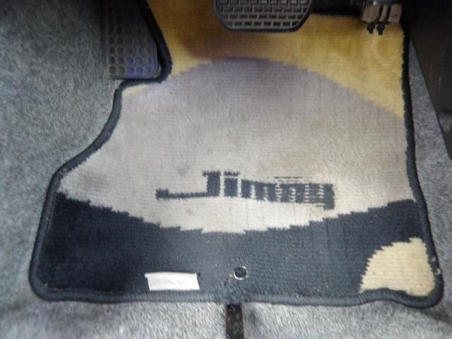 ジムニー ワイルドウインド　純正ルーフキャリア・社外ホイール・社外Ｆバンパーガード・ＣＤオーディオ・ウッドステアリング・皮調シートカバー・ブラックグリル・ＥＴＣ付（41枚目）