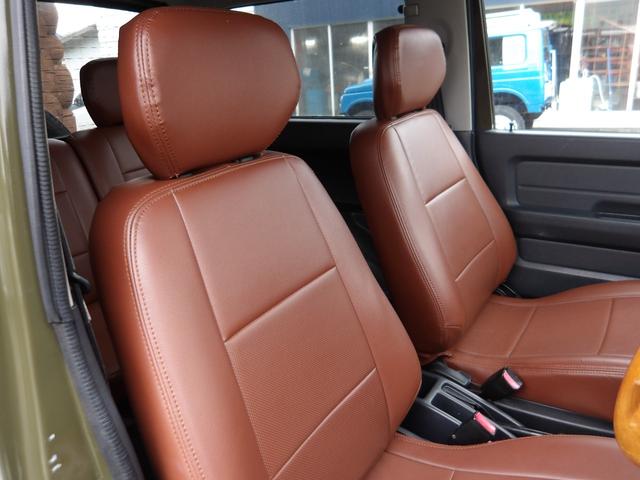 ジムニー ワイルドウインド　純正ルーフキャリア・社外ホイール・社外Ｆバンパーガード・ＣＤオーディオ・ウッドステアリング・皮調シートカバー・ブラックグリル・ＥＴＣ付（43枚目）