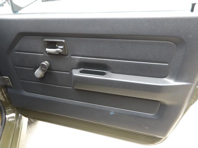 ジムニー ワイルドウインド　純正ルーフキャリア・社外ホイール・社外Ｆバンパーガード・ＣＤオーディオ・ウッドステアリング・皮調シートカバー・ブラックグリル・ＥＴＣ付（44枚目）