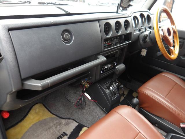 ジムニー ワイルドウインド　純正ルーフキャリア・社外ホイール・社外Ｆバンパーガード・ＣＤオーディオ・ウッドステアリング・皮調シートカバー・ブラックグリル・ＥＴＣ付（45枚目）