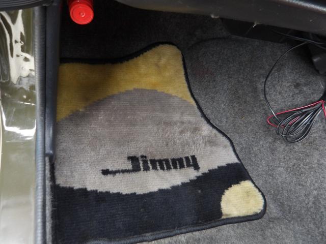 ジムニー ワイルドウインド　純正ルーフキャリア・社外ホイール・社外Ｆバンパーガード・ＣＤオーディオ・ウッドステアリング・皮調シートカバー・ブラックグリル・ＥＴＣ付（47枚目）