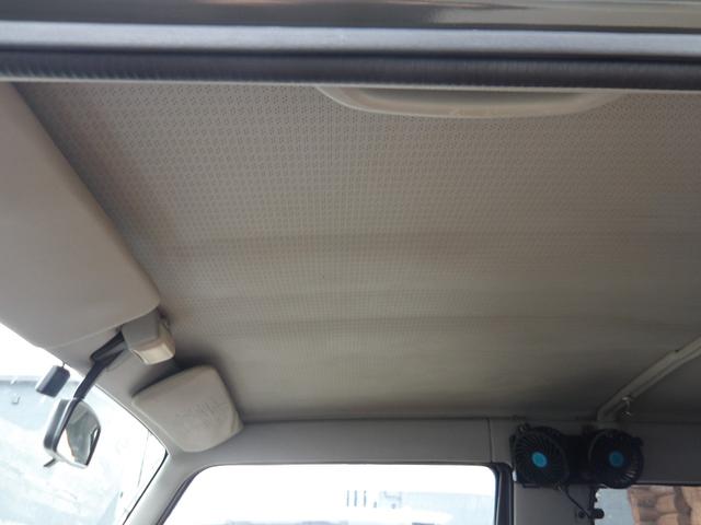 ジムニー ワイルドウインド　純正ルーフキャリア・社外ホイール・社外Ｆバンパーガード・ＣＤオーディオ・ウッドステアリング・皮調シートカバー・ブラックグリル・ＥＴＣ付（50枚目）