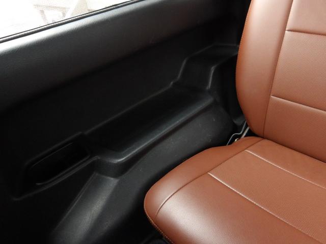 ジムニー ワイルドウインド　純正ルーフキャリア・社外ホイール・社外Ｆバンパーガード・ＣＤオーディオ・ウッドステアリング・皮調シートカバー・ブラックグリル・ＥＴＣ付（53枚目）