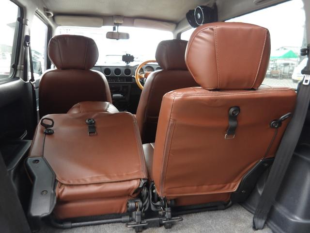 ジムニー ワイルドウインド　純正ルーフキャリア・社外ホイール・社外Ｆバンパーガード・ＣＤオーディオ・ウッドステアリング・皮調シートカバー・ブラックグリル・ＥＴＣ付（56枚目）