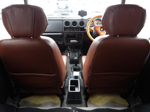 ジムニー ワイルドウインド　純正ルーフキャリア・社外ホイール・社外Ｆバンパーガード・ＣＤオーディオ・ウッドステアリング・皮調シートカバー・ブラックグリル・ＥＴＣ付（60枚目）