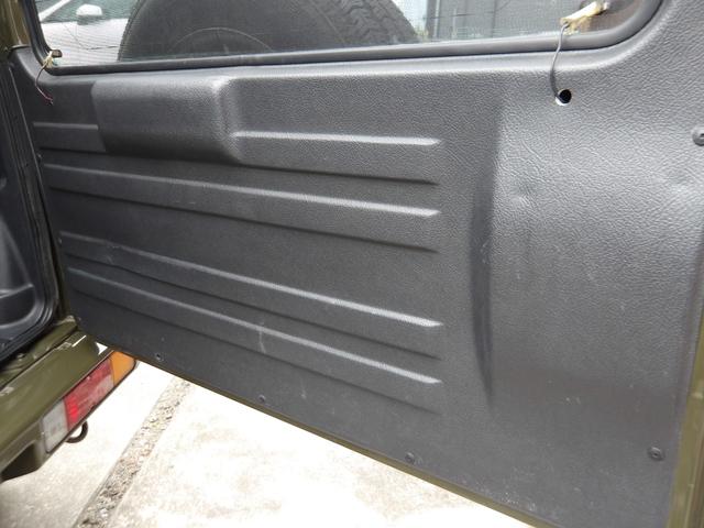 ジムニー ワイルドウインド　純正ルーフキャリア・社外ホイール・社外Ｆバンパーガード・ＣＤオーディオ・ウッドステアリング・皮調シートカバー・ブラックグリル・ＥＴＣ付（61枚目）