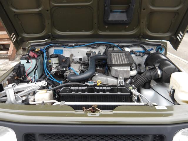 ジムニー ワイルドウインド　純正ルーフキャリア・社外ホイール・社外Ｆバンパーガード・ＣＤオーディオ・ウッドステアリング・皮調シートカバー・ブラックグリル・ＥＴＣ付（62枚目）