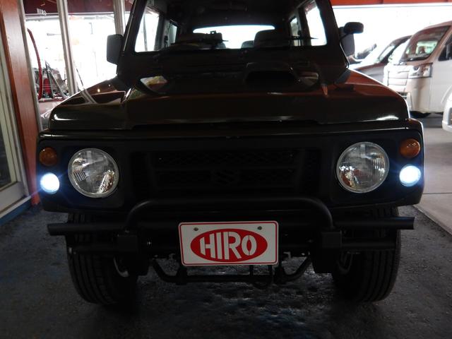 ジムニー ワイルドウインド　純正ルーフキャリア・社外ホイール・社外Ｆバンパーガード・ＣＤオーディオ・ウッドステアリング・皮調シートカバー・ブラックグリル・ＥＴＣ付（66枚目）