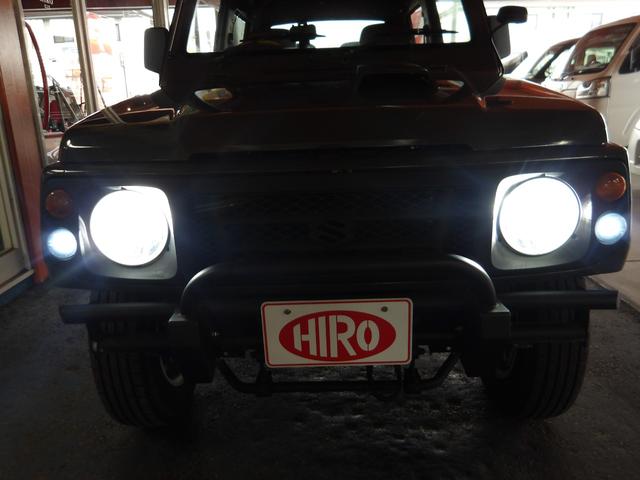 ジムニー ワイルドウインド　純正ルーフキャリア・社外ホイール・社外Ｆバンパーガード・ＣＤオーディオ・ウッドステアリング・皮調シートカバー・ブラックグリル・ＥＴＣ付（67枚目）