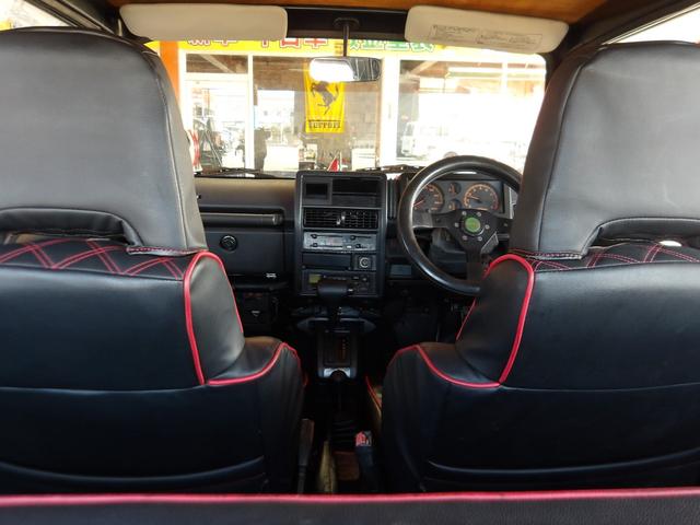 ジムニー ワイルドウインドリミテッド　リフトアップ公認・社外Ｆ＆Ｒバンパー・純正メッキグリル・純正ルーフキャリア・赤ステッチレザーシートカバー・タニグチ製ステップバー・社外ステアリング・純正１６インチＡＷ・Ｍ／Ｔタイヤ・天井ウッド張替（54枚目）