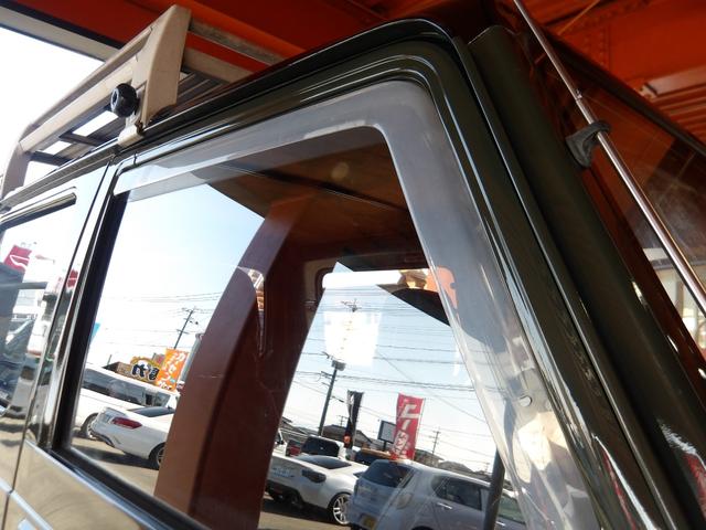 ジムニー ワイルドウインドリミテッド　リフトアップ公認・社外Ｆ＆Ｒバンパー・純正メッキグリル・純正ルーフキャリア・赤ステッチレザーシートカバー・タニグチ製ステップバー・社外ステアリング・純正１６インチＡＷ・Ｍ／Ｔタイヤ・天井ウッド張替（64枚目）