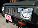 ジムニー ワイルドウインドリミテッド　リフトアップ公認・社外Ｆ＆Ｒバンパー・純正メッキグリル・純正ルーフキャリア・赤ステッチレザーシートカバー・タニグチ製ステップバー・社外ステアリング・純正１６インチＡＷ・Ｍ／Ｔタイヤ・天井ウッド張替（6枚目）