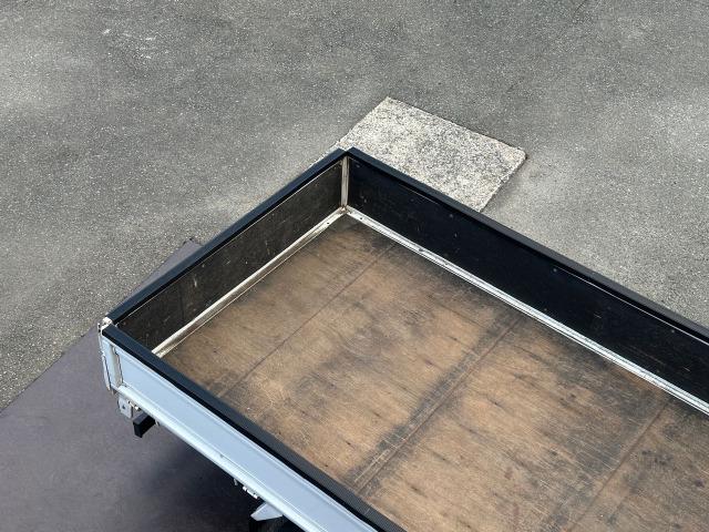 アトラストラック フルスーパーローＤＸ　３．０ディーゼルターボ　平ボディ　フロア５速　積載量１５００ｋｇ　４ナンバー　イージーヒルスタート　左側電動格納ミラー　リアＷタイヤ　タイミングチェーン　三方開　エアバッグ　取扱説明書　点検記録簿（40枚目）