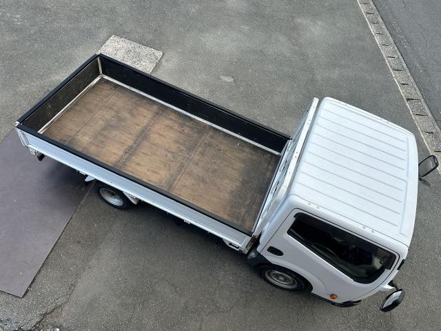 アトラストラック フルスーパーローＤＸ　３．０ディーゼルターボ　平ボディ　フロア５速　積載量１５００ｋｇ　４ナンバー　イージーヒルスタート　左側電動格納ミラー　リアＷタイヤ　タイミングチェーン　三方開　エアバッグ　取扱説明書　点検記録簿（41枚目）