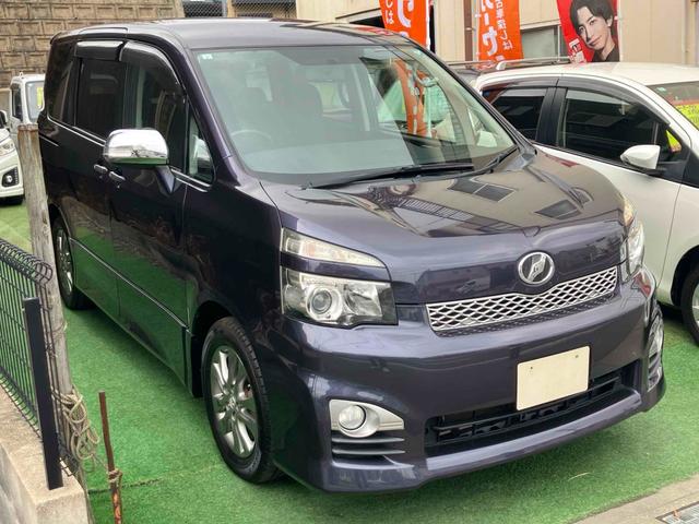 ヴォクシー ZS 煌 ETC バックカメラ ナビ TV 両側電動スライドドア HID スマートキー 電動格納ミラー 3列シート ウォークスルー CVT アルミホイール ミュージックプレイヤー接続可 記録簿 盗難防止システム(13枚目)