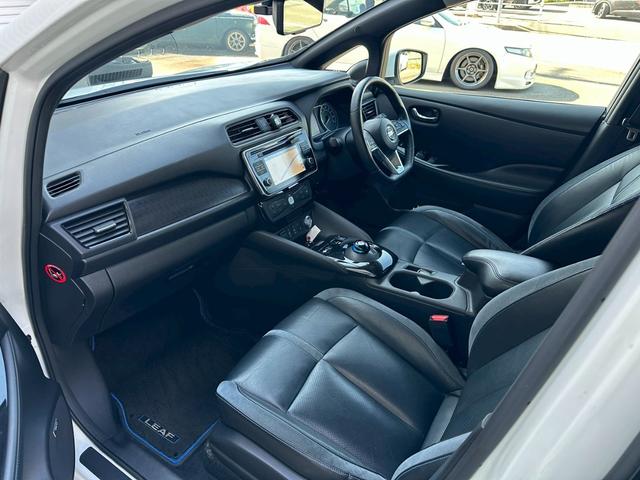 リーフ Ｇ　革シート　ＢＯＳＥ　プロパイロット　衝突軽減　全方位カメラ　コーナーセンサー　レーンアシスト　全周囲カメラ　ビルトインＥＴＣ　シートヒーター　オートパーキングアシスト　メモリーナビ　追従オートクルーズ（25枚目）