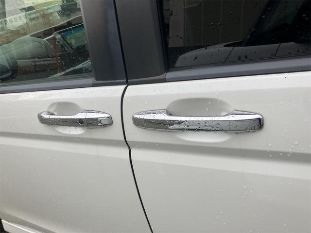 ステップワゴンスパーダ Ｚ　ＥＴＣ　バックカメラ　ナビ　ＴＶ　オートクルーズコントロール　両側電動スライドドア　オートライト　ＨＩＤ　スマートキー　アイドリングストップ　電動格納ミラー　３列シート　ＣＶＴ　アルミホイール　ＣＤ（32枚目）