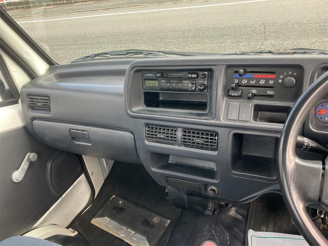 サンバートラック ＴＣ　４ＷＤ　ＭＴ　エアコン　パワーステアリング　運転席エアバッグ（27枚目）