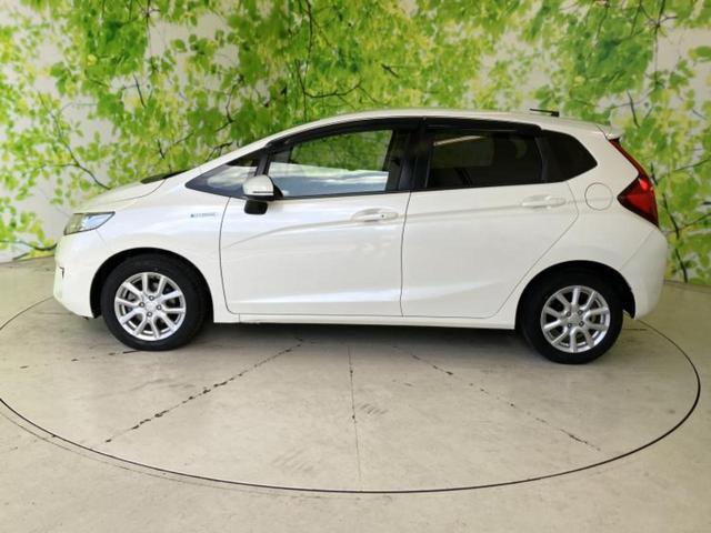 フィットハイブリッド ハイブリッド・Ｌパッケージ　保証書／純正　ＳＤナビ／シティーブレーキアクティブシステム（ホンダ）／シート　ハーフレザー／ヘッドランプ　ＬＥＤ／ＨＤＭＩ接続／ＥＴＣ／ＥＢＤ付ＡＢＳ／横滑り防止装置／アイドリングストップ（2枚目）