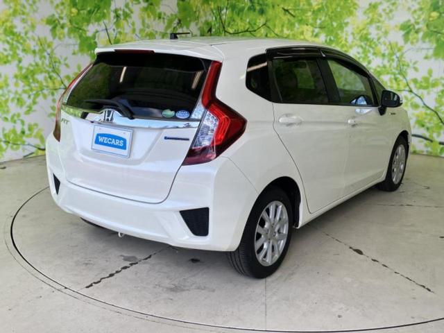 フィットハイブリッド ハイブリッド・Ｌパッケージ　保証書／純正　ＳＤナビ／シティーブレーキアクティブシステム（ホンダ）／シート　ハーフレザー／ヘッドランプ　ＬＥＤ／ＨＤＭＩ接続／ＥＴＣ／ＥＢＤ付ＡＢＳ／横滑り防止装置／アイドリングストップ（3枚目）