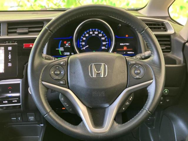 フィットハイブリッド ハイブリッド・Ｌパッケージ　保証書／純正　ＳＤナビ／シティーブレーキアクティブシステム（ホンダ）／シート　ハーフレザー／ヘッドランプ　ＬＥＤ／ＨＤＭＩ接続／ＥＴＣ／ＥＢＤ付ＡＢＳ／横滑り防止装置／アイドリングストップ（15枚目）