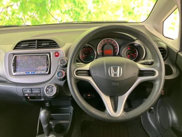 フィット 13G・10thアニバーサリー 新品タイヤ/保証書/純正 ナビ/ETC/EBD付ABS/バックモニター/フルセグTV/エアバッグ 運転席/エアバッグ 助手席/衝突安全ボディ/パワーウインドウ/キーレスエントリー/パワーステアリング(5枚目)