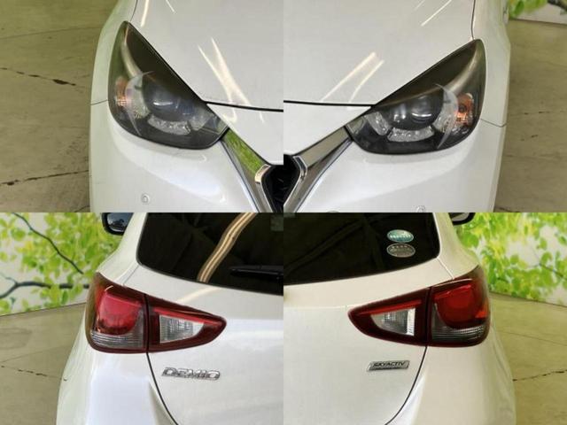 デミオ 13Sツーリング 保証書/純正 SDナビ/衝突安全装置/シートヒーター/全方位モニター/ヘッドランプ LED/Bluetooth接続/ETC/EBD付ABS/横滑り防止装置/アイドリングストップ/フルセグTV(52枚目)